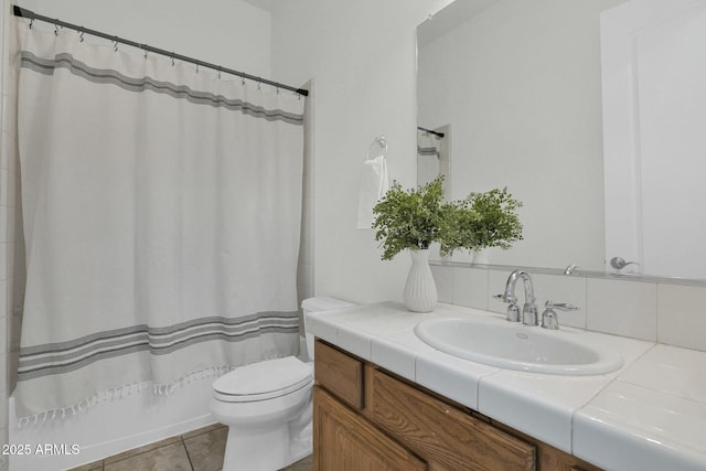 7917 S 32nd Ter, Phoenix, AZ 85042 - full bathroom featuring tile patterned flooring, vanity, shower / bathtub combination with curtain, and toilet