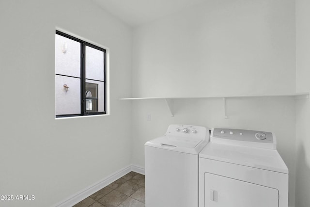 7917 S 32nd Ter, Phoenix, AZ 85042 - laundry area with light tile patterned flooring and independent washer and dryer