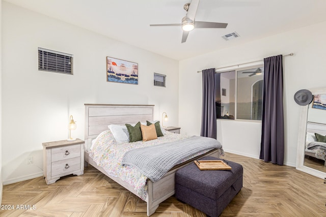 bedroom featuring ceiling fan and light parquet flooring