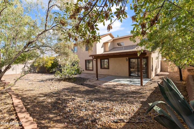 back of house featuring a patio area