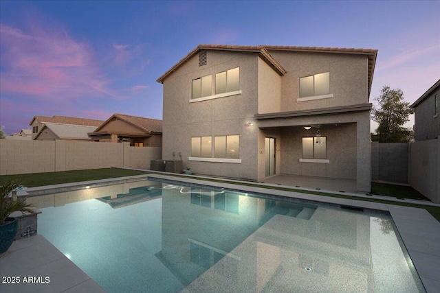 view of swimming pool featuring a fenced backyard and a fenced in pool