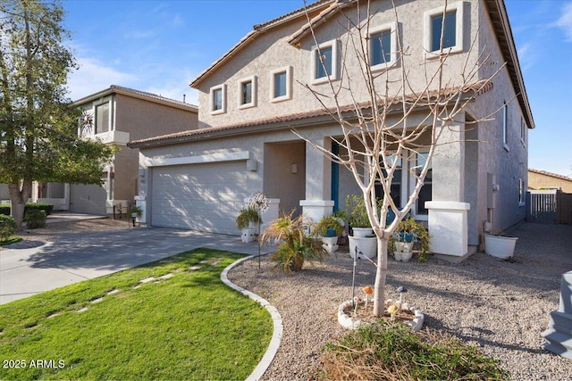 view of front of house with stucco siding, concrete driveway, and a garage