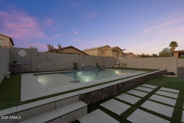 view of pool featuring a patio area, a fenced in pool, and a fenced backyard