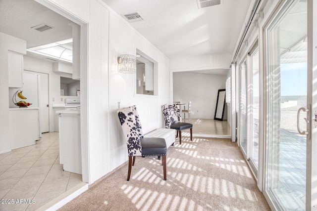 interior space featuring a notable chandelier and light tile patterned floors