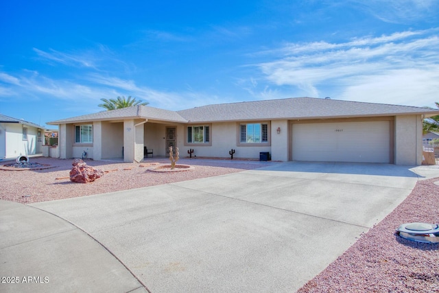 single story home featuring a garage