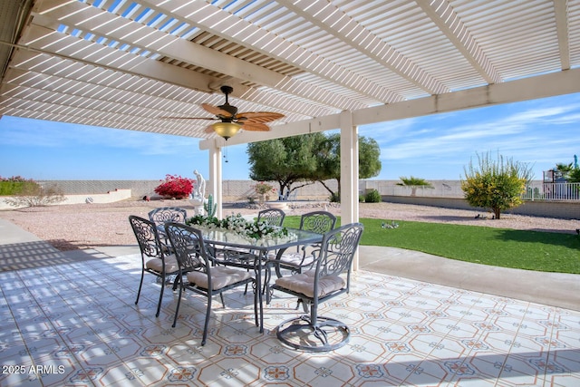 view of patio / terrace featuring ceiling fan and a pergola