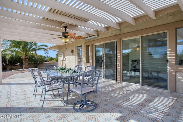 view of patio with ceiling fan and a pergola