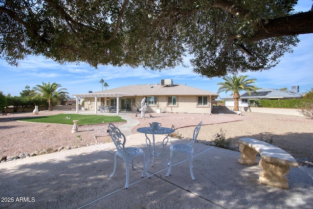 back of house featuring a patio area