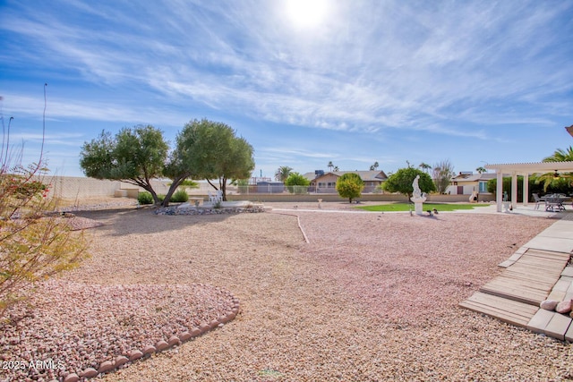 view of yard with a pergola