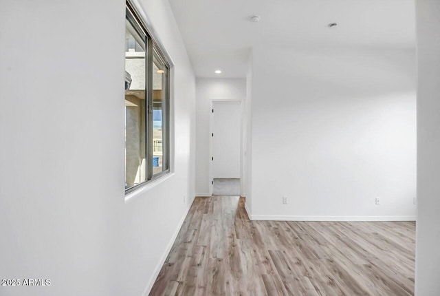 spare room featuring light hardwood / wood-style floors