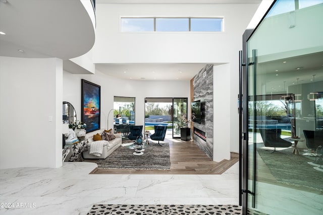 living room featuring a high ceiling