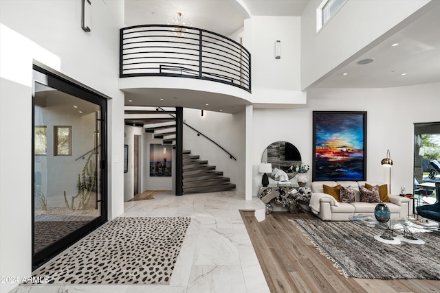 entrance foyer with a wealth of natural light and a high ceiling