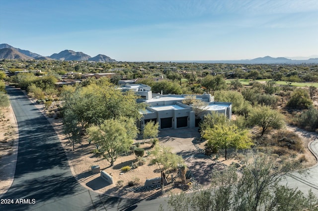 birds eye view of property featuring a mountain view