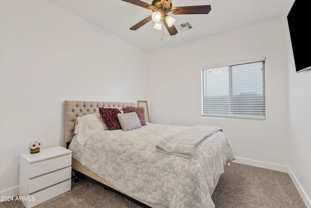 bedroom featuring ceiling fan and carpet floors