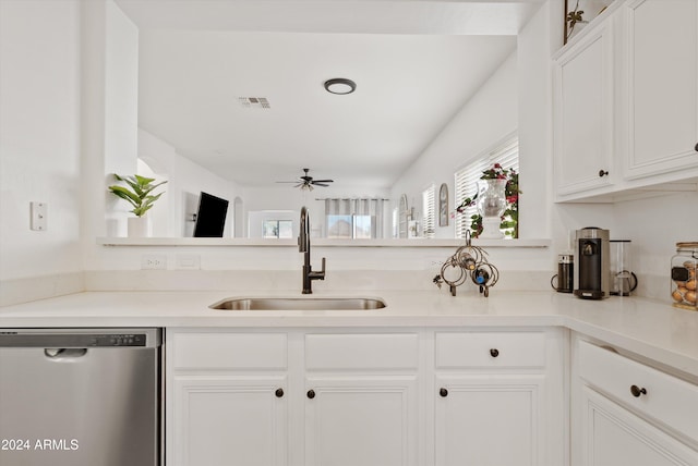 kitchen with dishwasher, white cabinets, ceiling fan, and sink