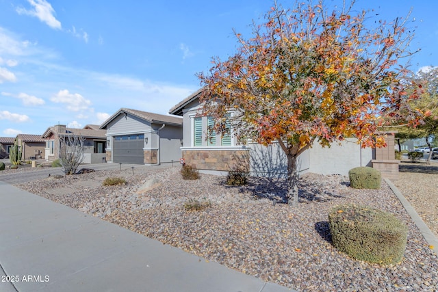 obstructed view of property with a garage