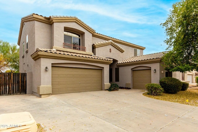 mediterranean / spanish-style home featuring a garage