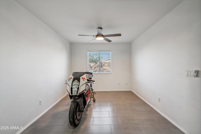 interior space featuring ceiling fan