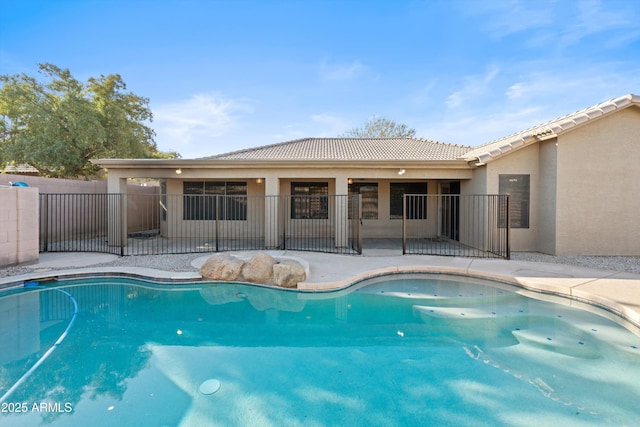 view of pool featuring a patio