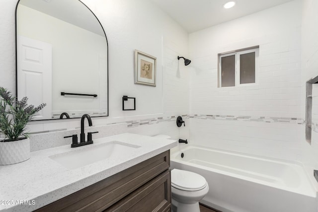 48 S Catalina St, Gilbert, AZ 85233 - bathroom featuring vanity,  shower combination, recessed lighting, and tile walls