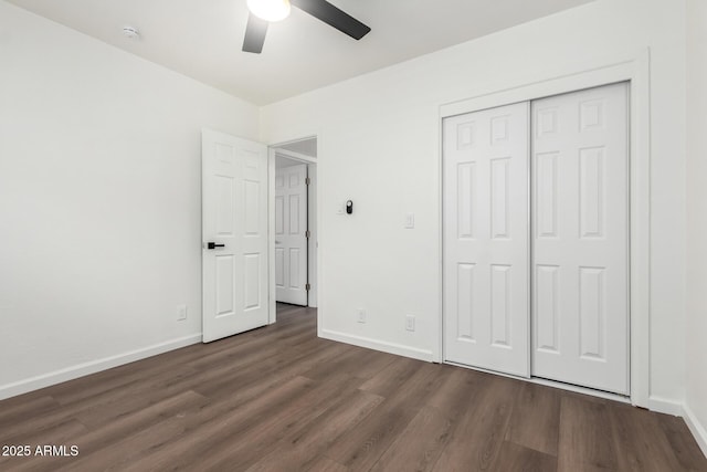 48 S Catalina St, Gilbert, AZ 85233 - unfurnished bedroom featuring dark wood finished floors, a closet, and a ceiling fan