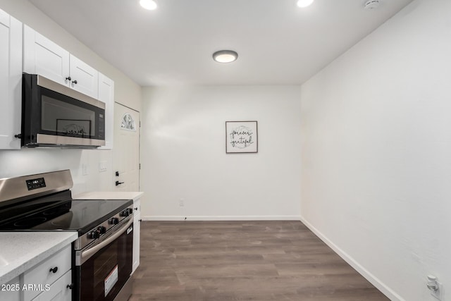 48 S Catalina St, Gilbert, AZ 85233 - kitchen with appliances with stainless steel finishes, light countertops, white cabinets, recessed lighting, and dark wood-style floors