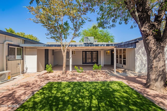 48 S Catalina St, Gilbert, AZ 85233 - back of house with a lawn and a patio area