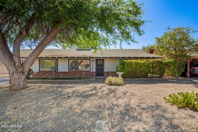 48 S Catalina St, Gilbert, AZ 85233 - single story home featuring brick siding, a shingled roof, and board and batten siding