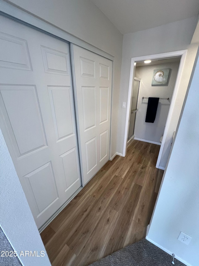 hall featuring dark hardwood / wood-style floors