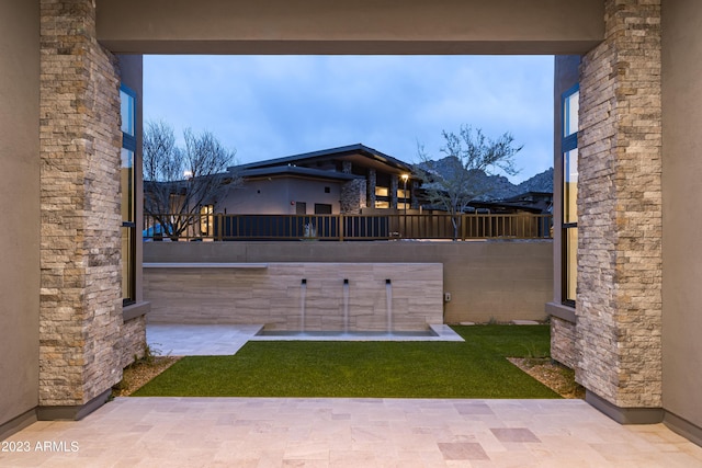 view of patio / terrace with fence