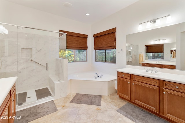 4229 E Nightingale Ln, Gilbert, AZ 85298 - bathroom with vanity, a bath, and a marble finish shower