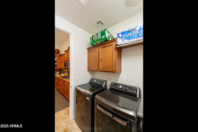 4229 E Nightingale Ln, Gilbert, AZ 85298 - laundry room featuring independent washer and dryer and cabinet space