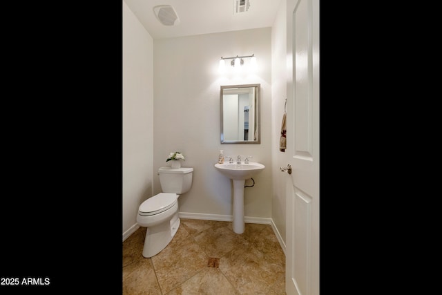 4229 E Nightingale Ln, Gilbert, AZ 85298 - bathroom featuring toilet, a sink, baseboards, and tile patterned flooring