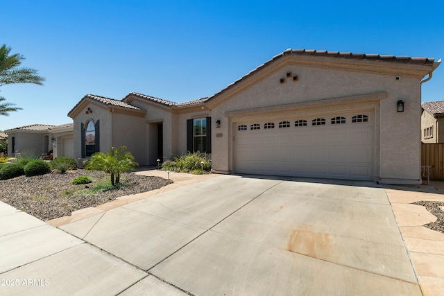 4229 E Nightingale Ln, Gilbert, AZ 85298 - view of front facade with stucco siding, a tiled roof, driveway, and a garage