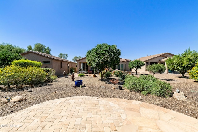 4229 E Nightingale Ln, Gilbert, AZ 85298 - rear view of property featuring a patio area