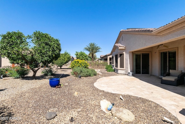 4229 E Nightingale Ln, Gilbert, AZ 85298 - view of yard featuring ceiling fan and a patio area