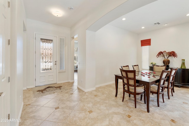 4229 E Nightingale Ln, Gilbert, AZ 85298 - foyer entrance with recessed lighting, light tile patterned flooring, baseboards, and arched walkways