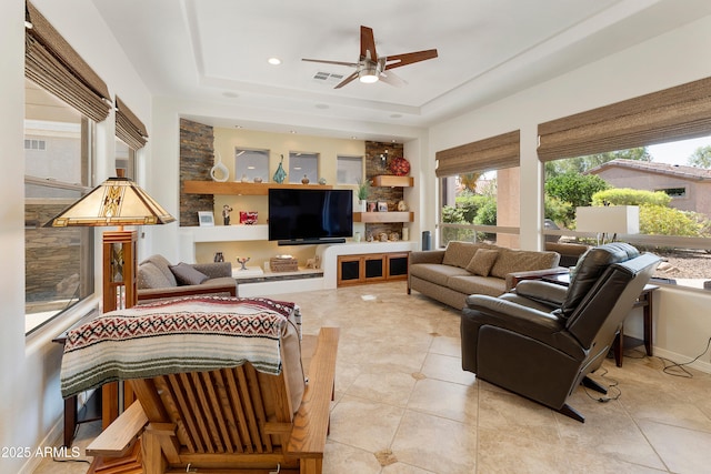 4229 E Nightingale Ln, Gilbert, AZ 85298 - living area featuring a tray ceiling, a ceiling fan, light tile patterned floors, and recessed lighting
