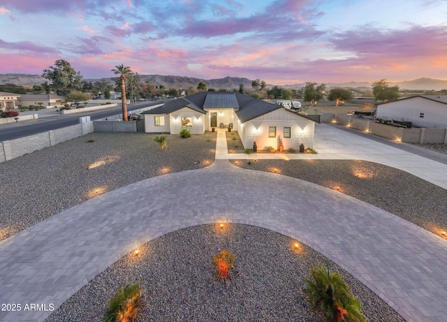 view of front of property with a mountain view