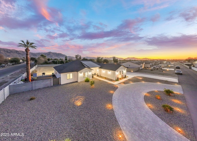 view of front of property with a mountain view