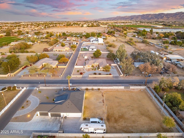 aerial view at dusk with a mountain view