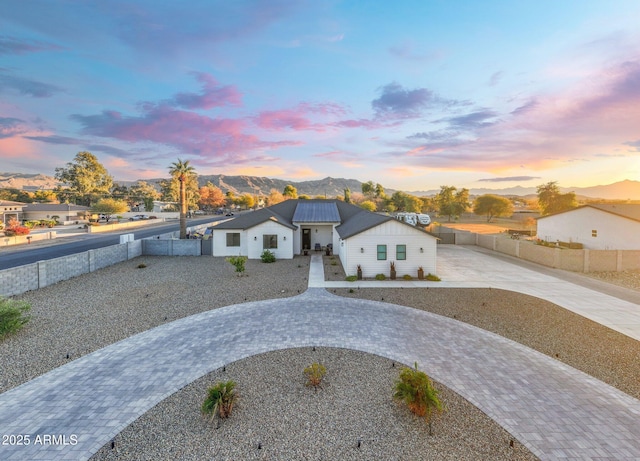 view of front of property with a mountain view