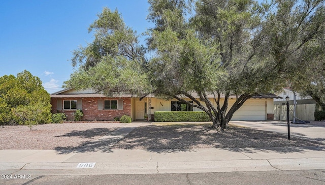 view of front of property with a garage