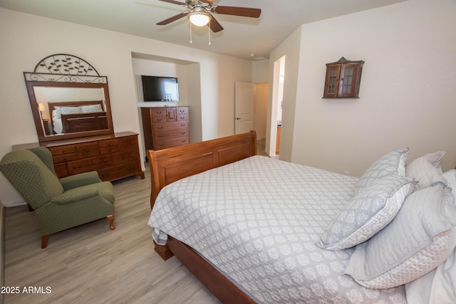 bedroom featuring ceiling fan and light wood-style floors