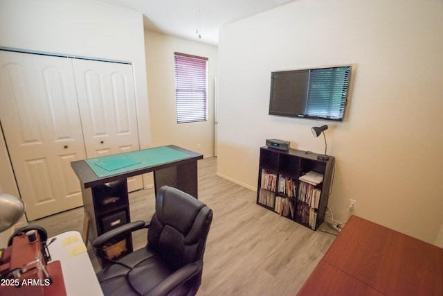 office space with light wood-style flooring
