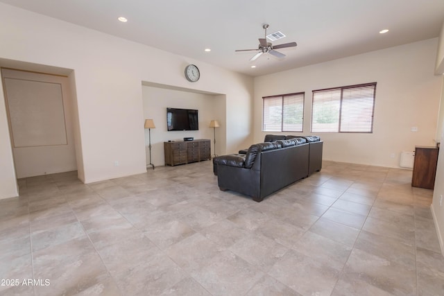 living room featuring a ceiling fan, recessed lighting, light tile patterned floors, and visible vents