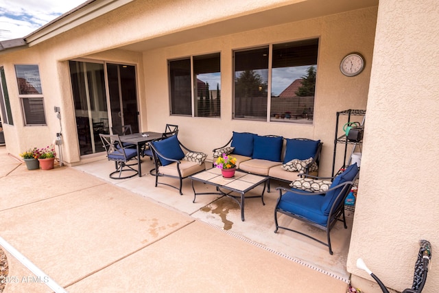 view of patio / terrace featuring outdoor dining area and outdoor lounge area