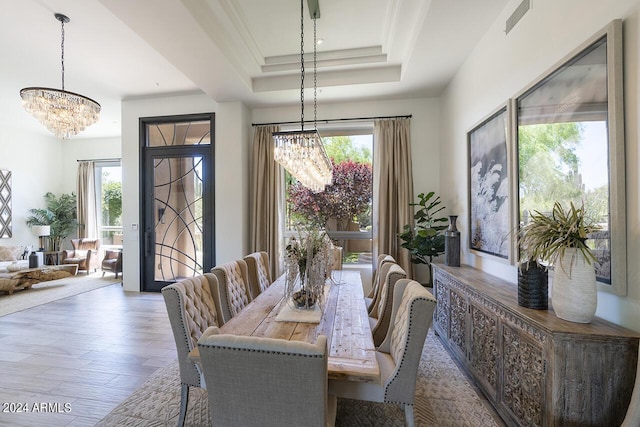 30600 N Pima Rd Unit 49, Scottsdale, AZ 85266 - dining space featuring a notable chandelier, plenty of natural light, and a tray ceiling