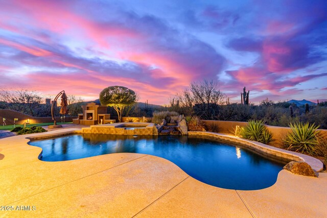 30600 N Pima Rd Unit 49, Scottsdale, AZ 85266 - pool at dusk with an in ground hot tub, an outdoor pool, and a patio