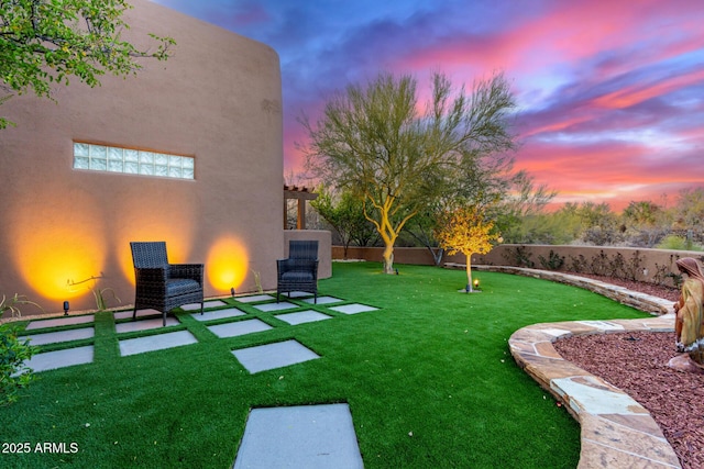 30600 N Pima Rd Unit 49, Scottsdale, AZ 85266 - yard at dusk featuring a patio area and fence